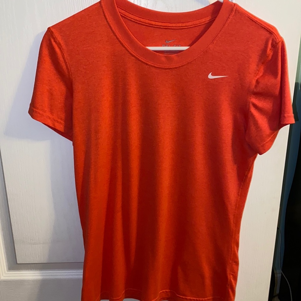 orange nike athletic shirt